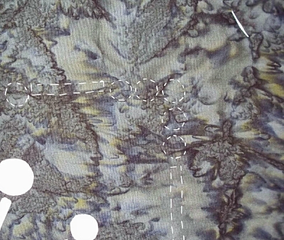 pic. 6Basted on the design lines through all layers of fabric. Viewed from the front.