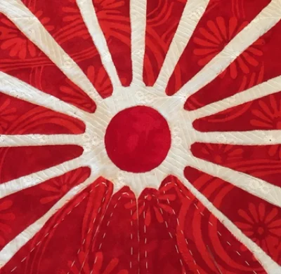 Playing with my own designs, I've created a Red & White Quilt. The quilt's Center circle has a 1 1/2" diameter.
