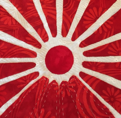 Playing with my own designs, I've created a Red & White Quilt. The quilt's Center circle has a 1 1/2" diameter.