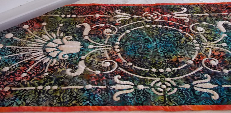 Victorian Urn table runner I (18" x 42"). Hand reverse applique.