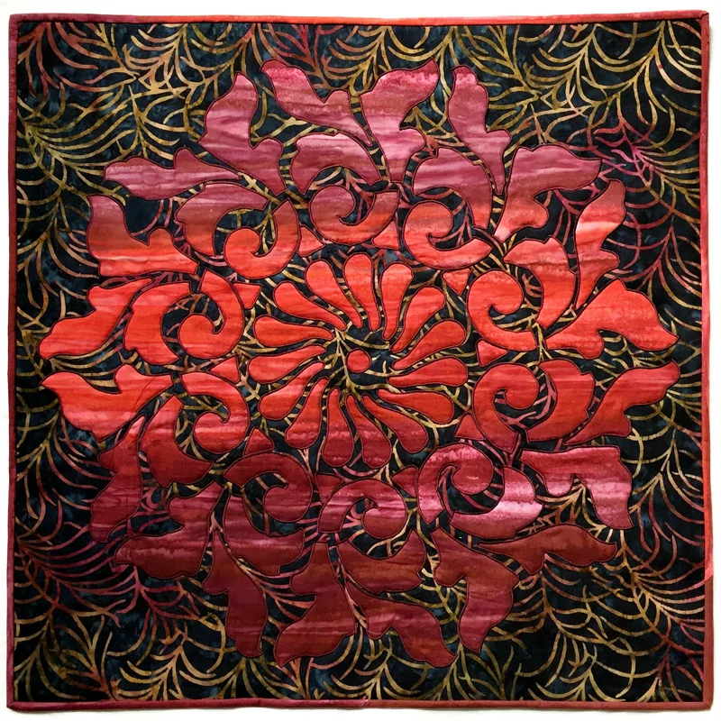 Radiance, Medallion V (26" x 26") created by Machine reverse applique.