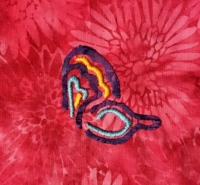 Satin stitch of Golden orange wing bits.
