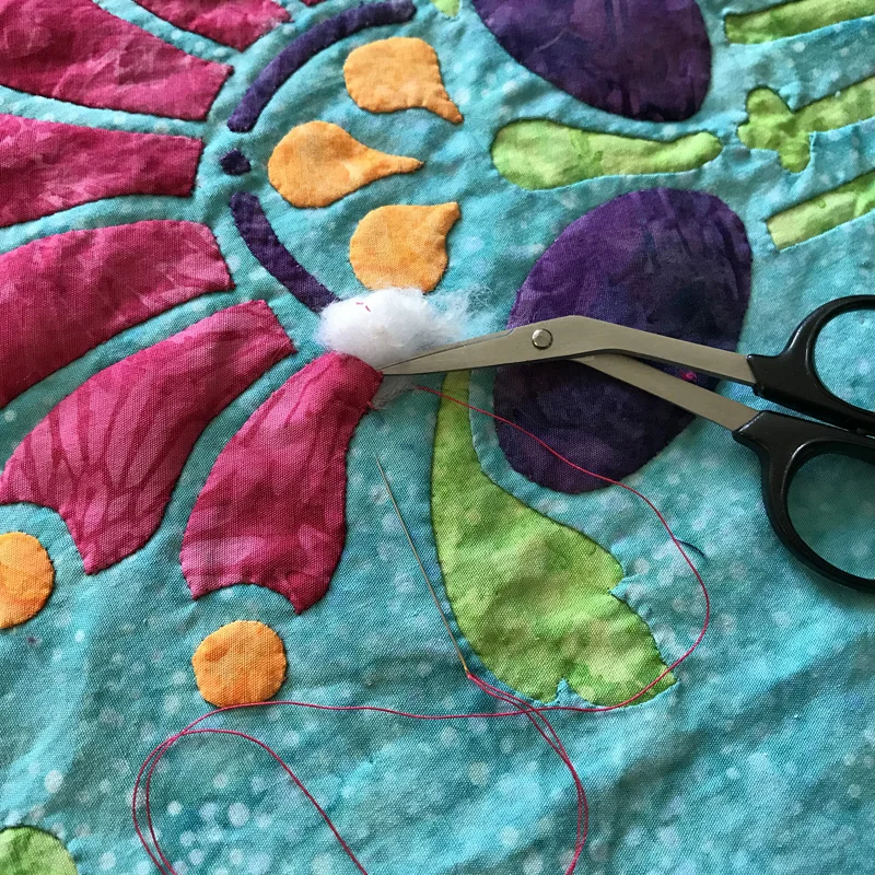 A quarter size bit of stuffing.