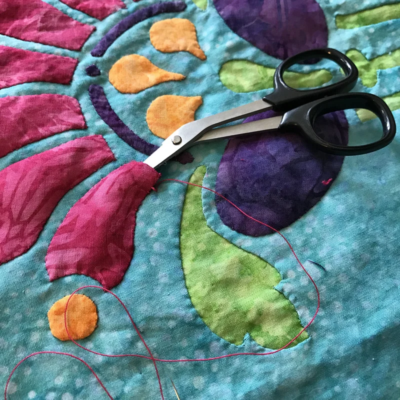 Using Kai scissors to puff the petal.