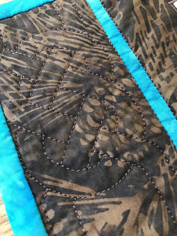 Quilting of Place mat sides.