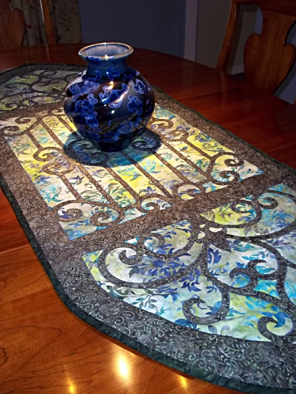 Karen's Hospitality, Table runner IV (20" x 52.5"). Machine reverse applique.
