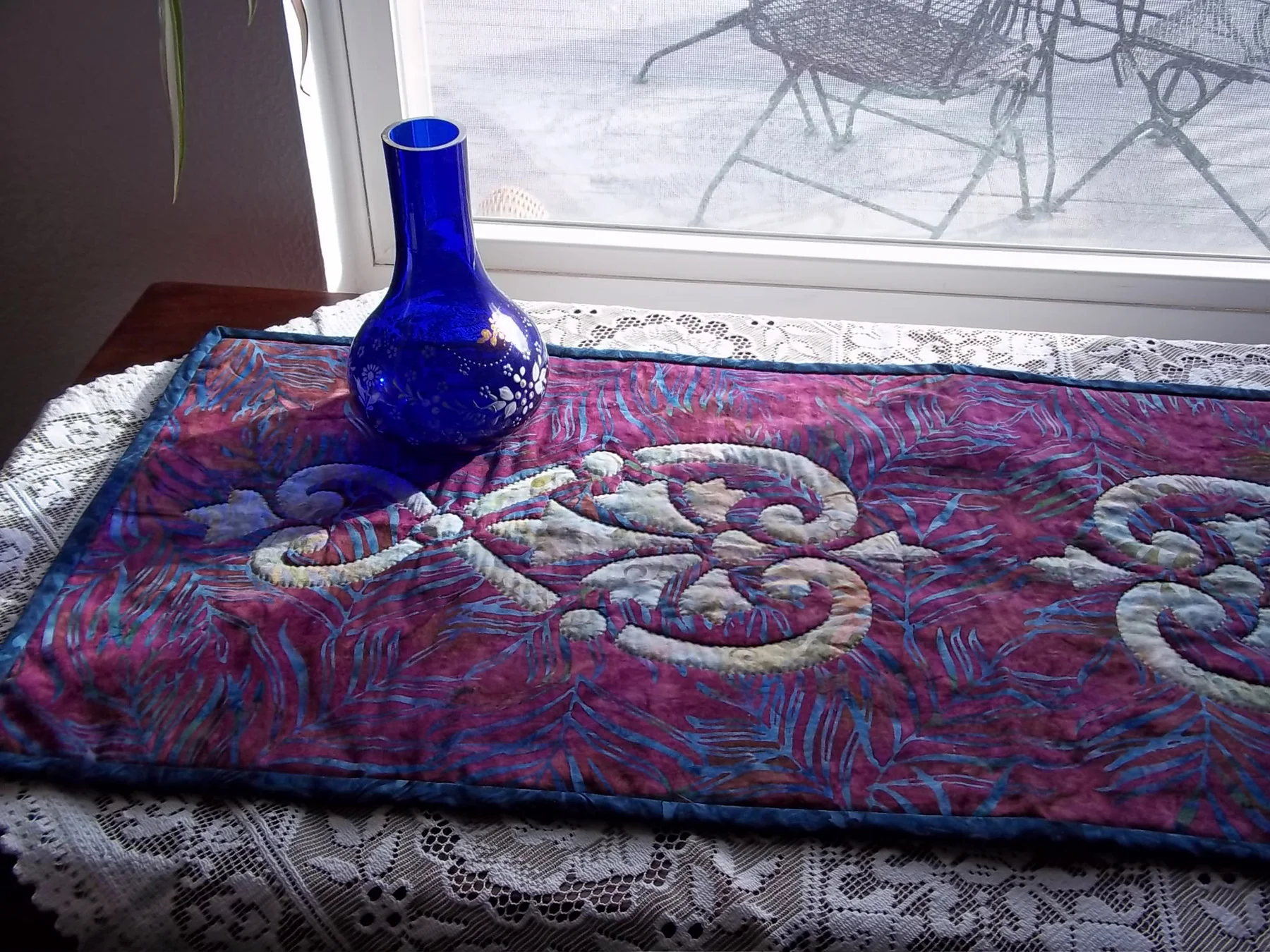 Hearts & Fleurs table runner (13” x 36”) for hand or machine reverse applique.