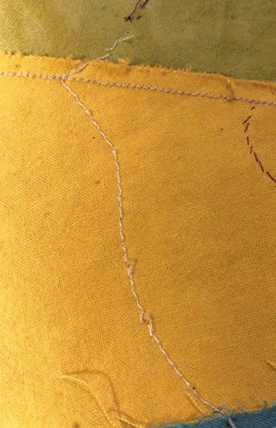 Whirlwind Medallion VI , viewed from the back: every 3rd - 4th bobbin stitch clipped.