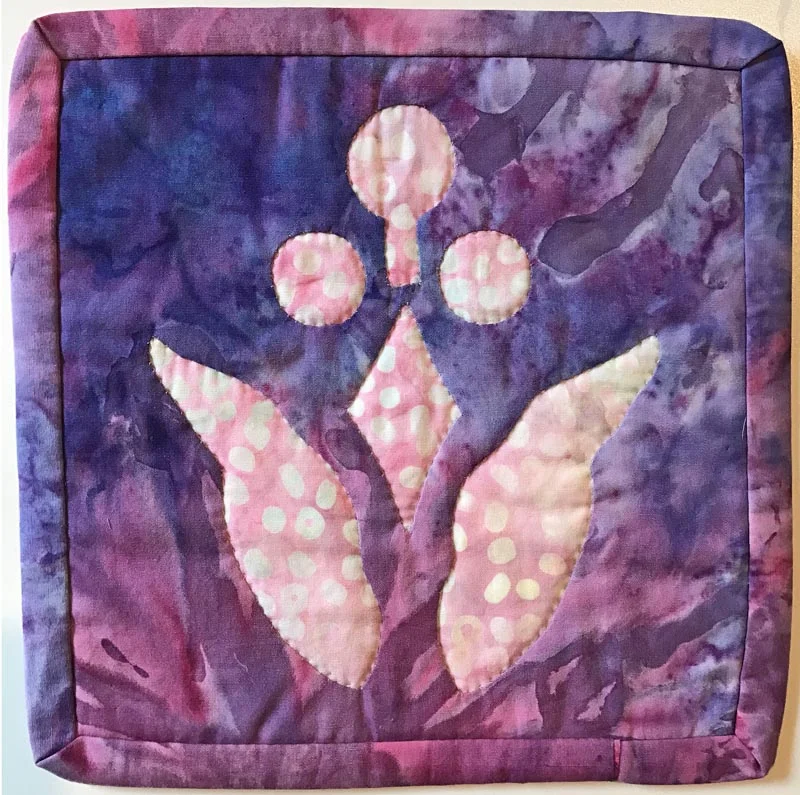 Lollipop Flower block stitched by hand.