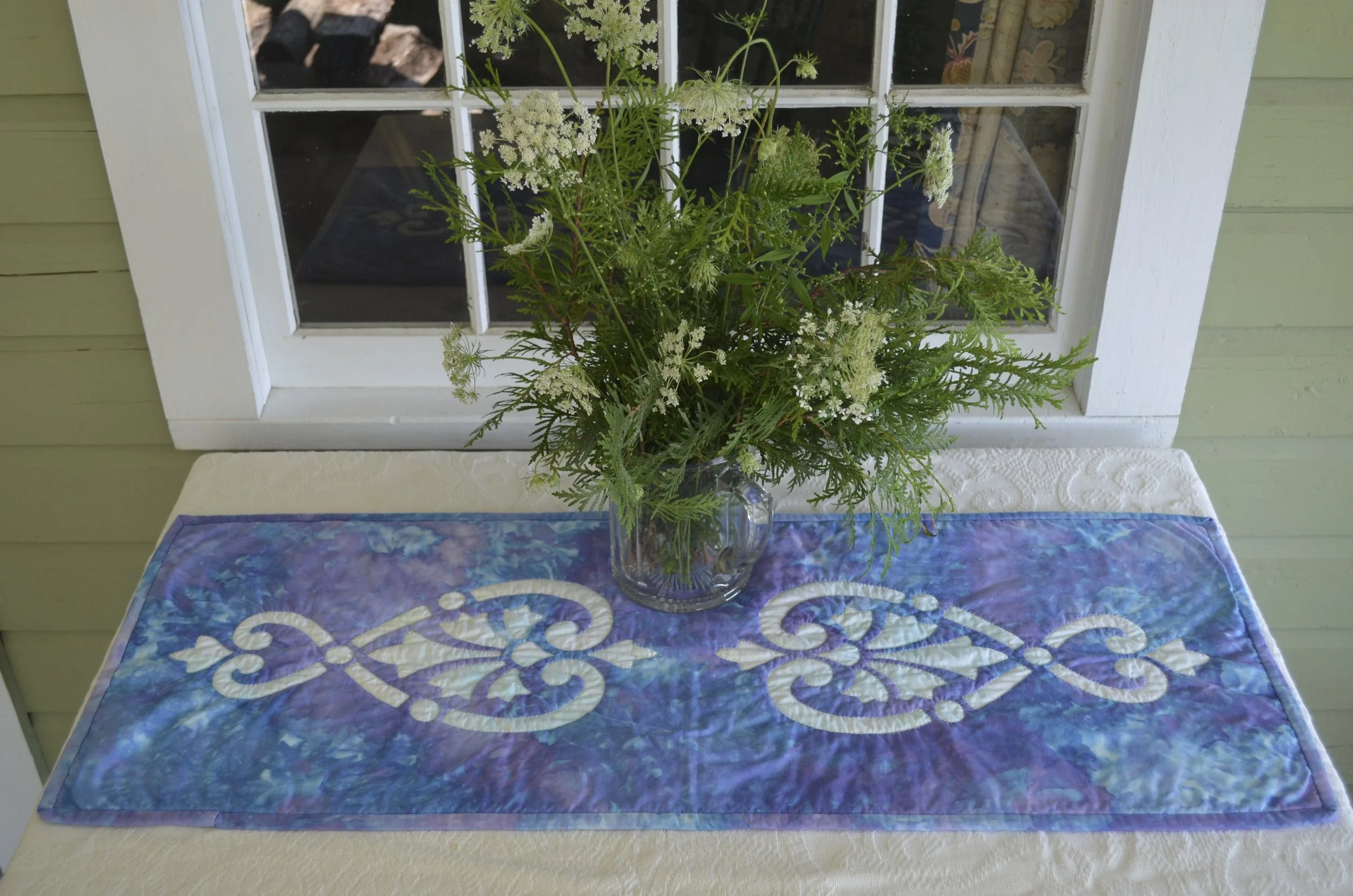 This sample was created by hand reverse applique.