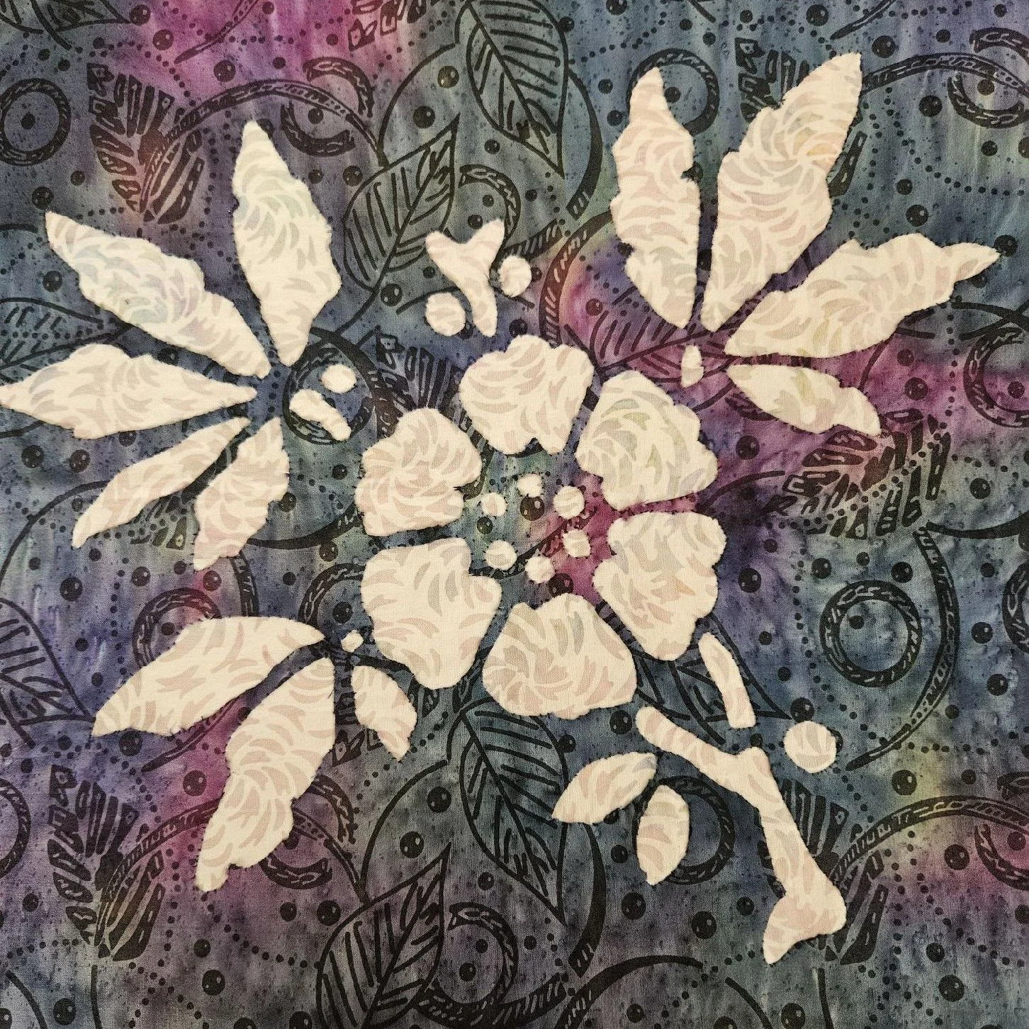 CUSTOMER'S CREATIONS!
Rhea recently sent me her version of our Apple Blossom 4/9 pattern beautifully created with hand reverse applique.  She's working on all 9 of our flowers in the Victorian Flower Garden series.  A while back she sent me the Iris,