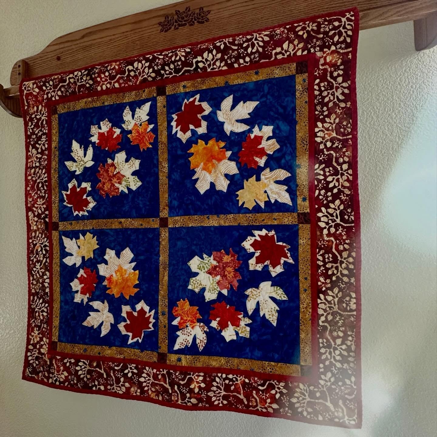 Autumn Window is all quilted and ready to inspire! Brings to life New England&rsquo;s maple leaves swirling&hellip;dancing on the breezes in all their splendor. Applique and reverse appliqu&eacute; leaves. Class project 2 on AQS SEAM Quilt Cruise-CAN