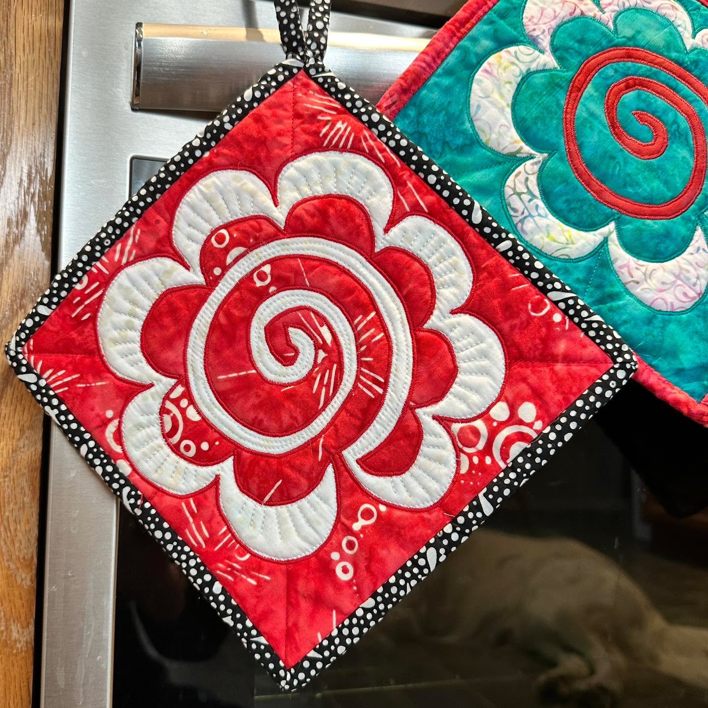 Make a happy Sunflower Potholder while learning Machine Reverse Applique at quiltstorebroomfield, this Saturday, May 16! This fun and empowering class is taught by reverse applique expert and pattern designer Margaret Willingham of Eye of the Beholde