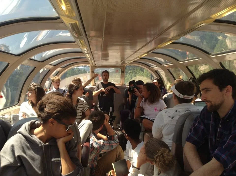 MTP participants on the train, reflecting and collaborating.