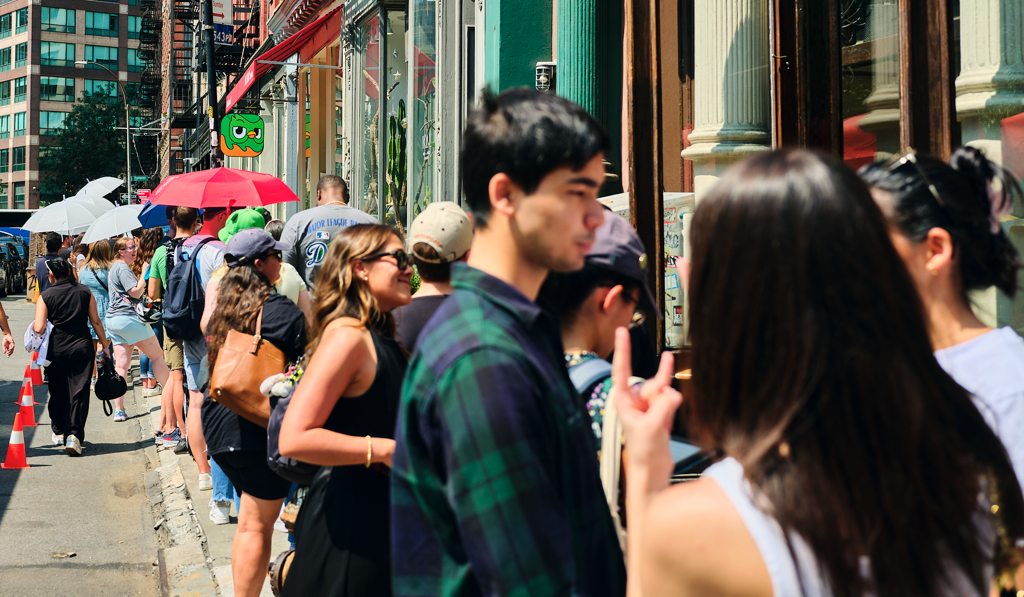 The experience started with the line: fans were entertained by male models dressed as Duo who performed for and interacted with attendees as they waited in line. 