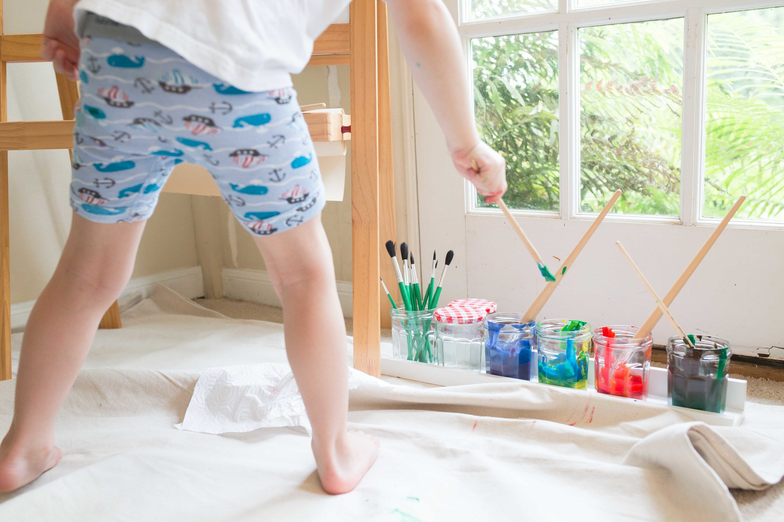 family photography - little boy with paints