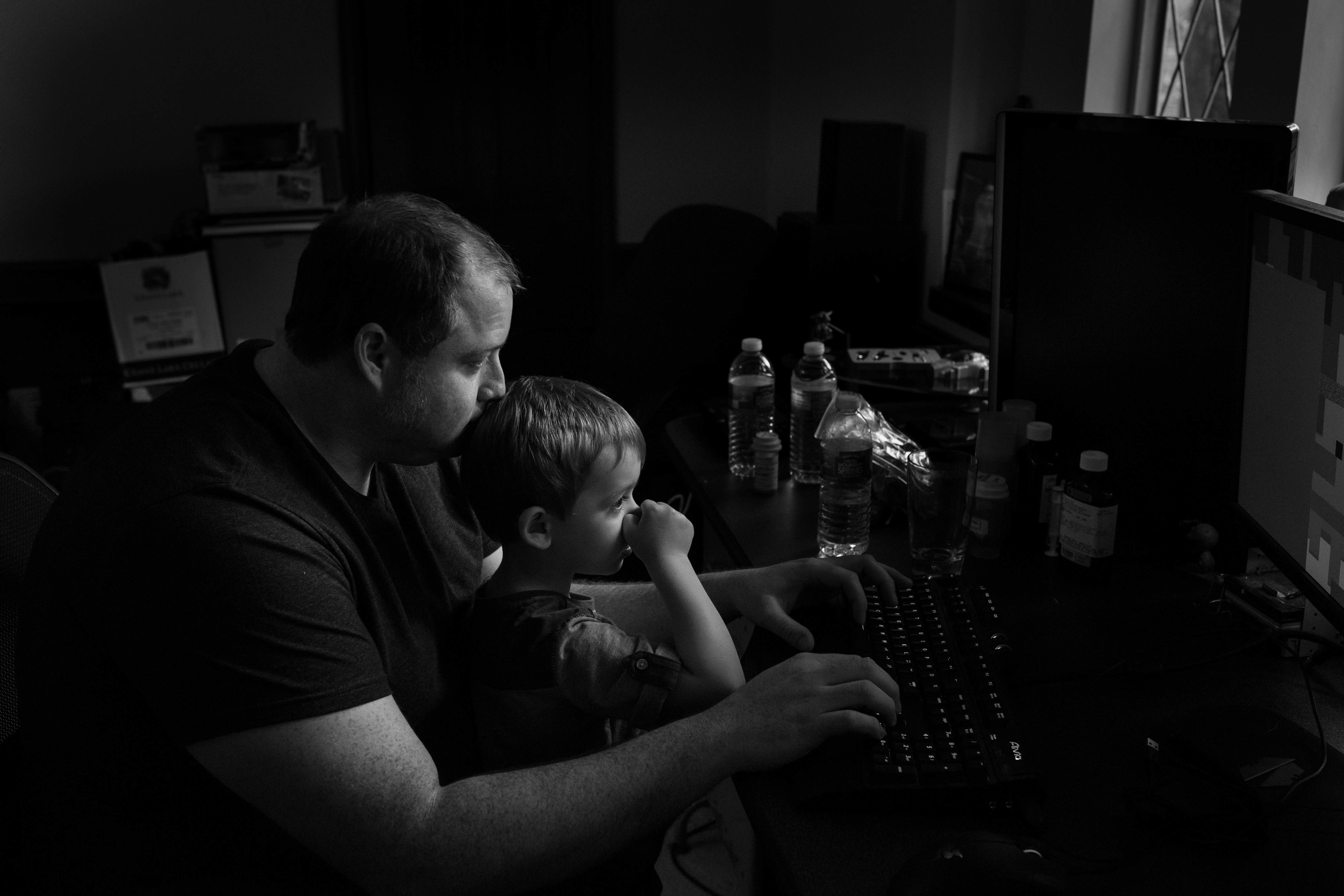 family portraits - boy and dad at computer