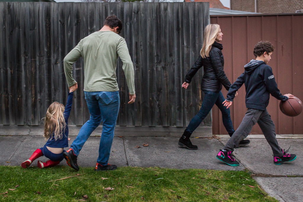 professional family photos - family walking together