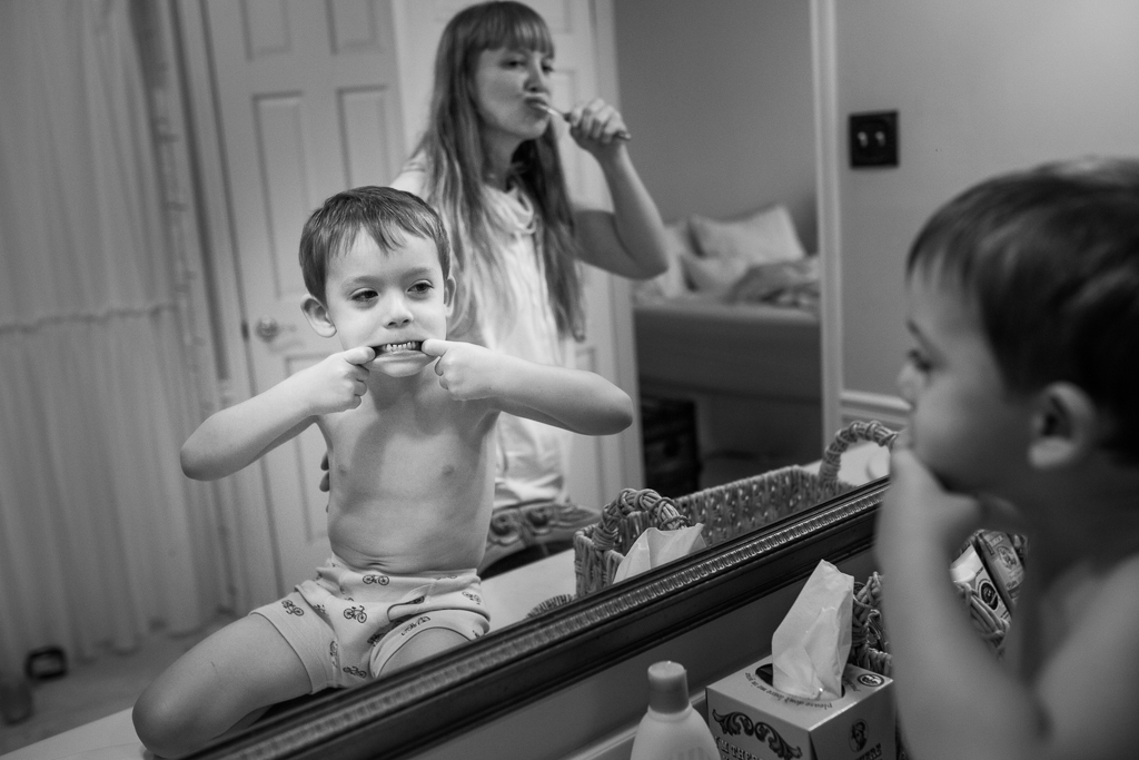 family photographer - making faces in mirror