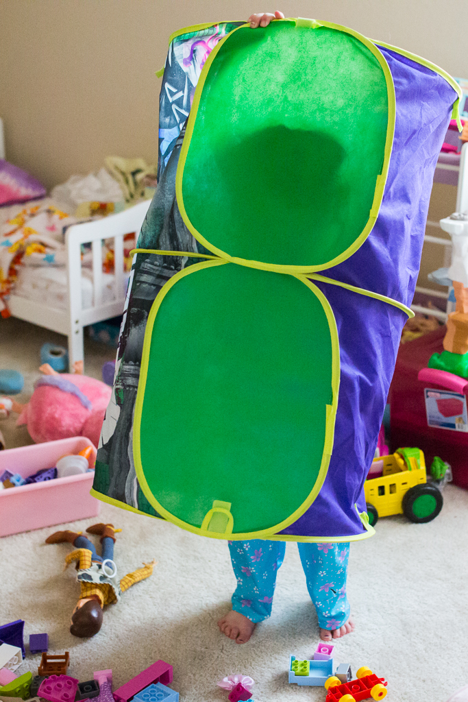 girl in toy tunnel