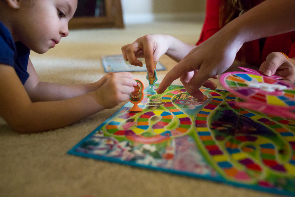 family playing candy land