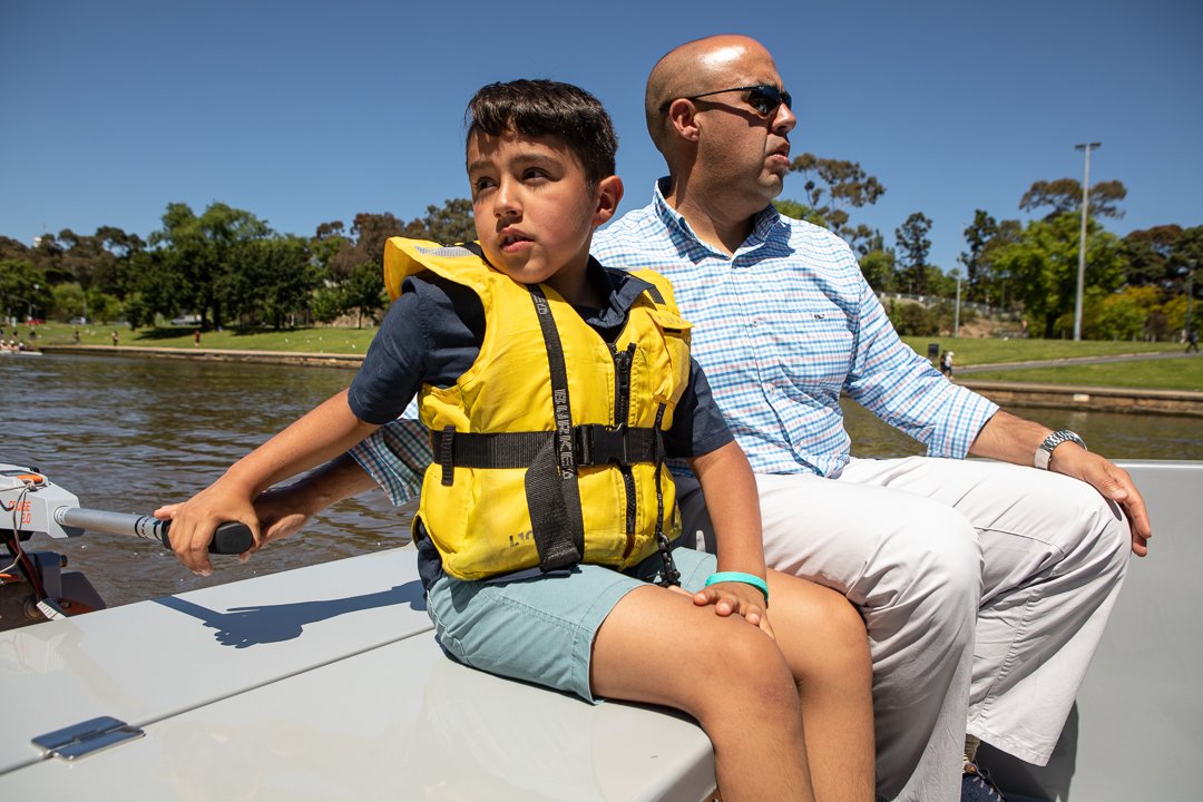 family portrait - steering boat in melbourne