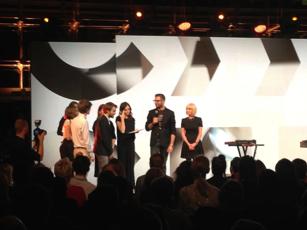 Dennis Valle, Senior Vice President, Global Marketing at Versace , and Grazyna Kulczyk, Owner of Stary Browar, Tech Investor, and the richest woman in Poland present Clother with their prizes.