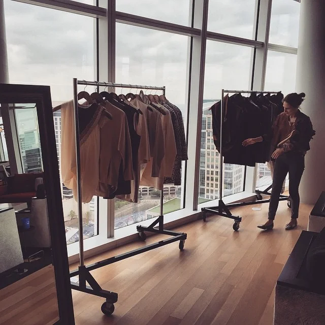 Designer Lee Anderson inspects the racks at Museum Tower in Dallas, TX. 