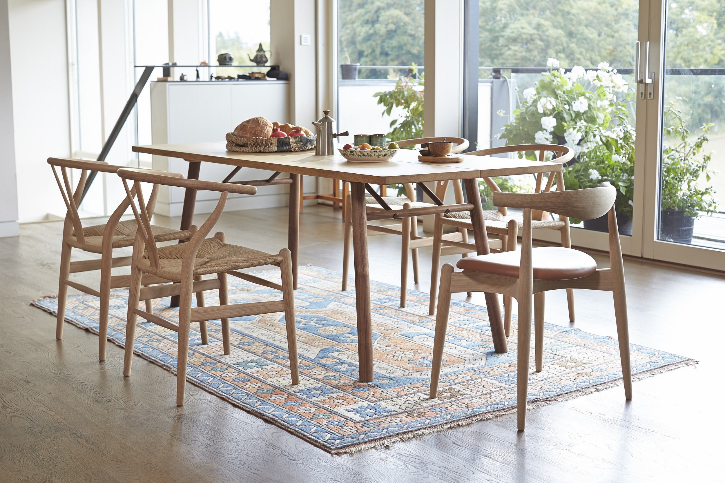 Hand crafted Dining Table and chairs by furniture designer and maker Namon Gaston