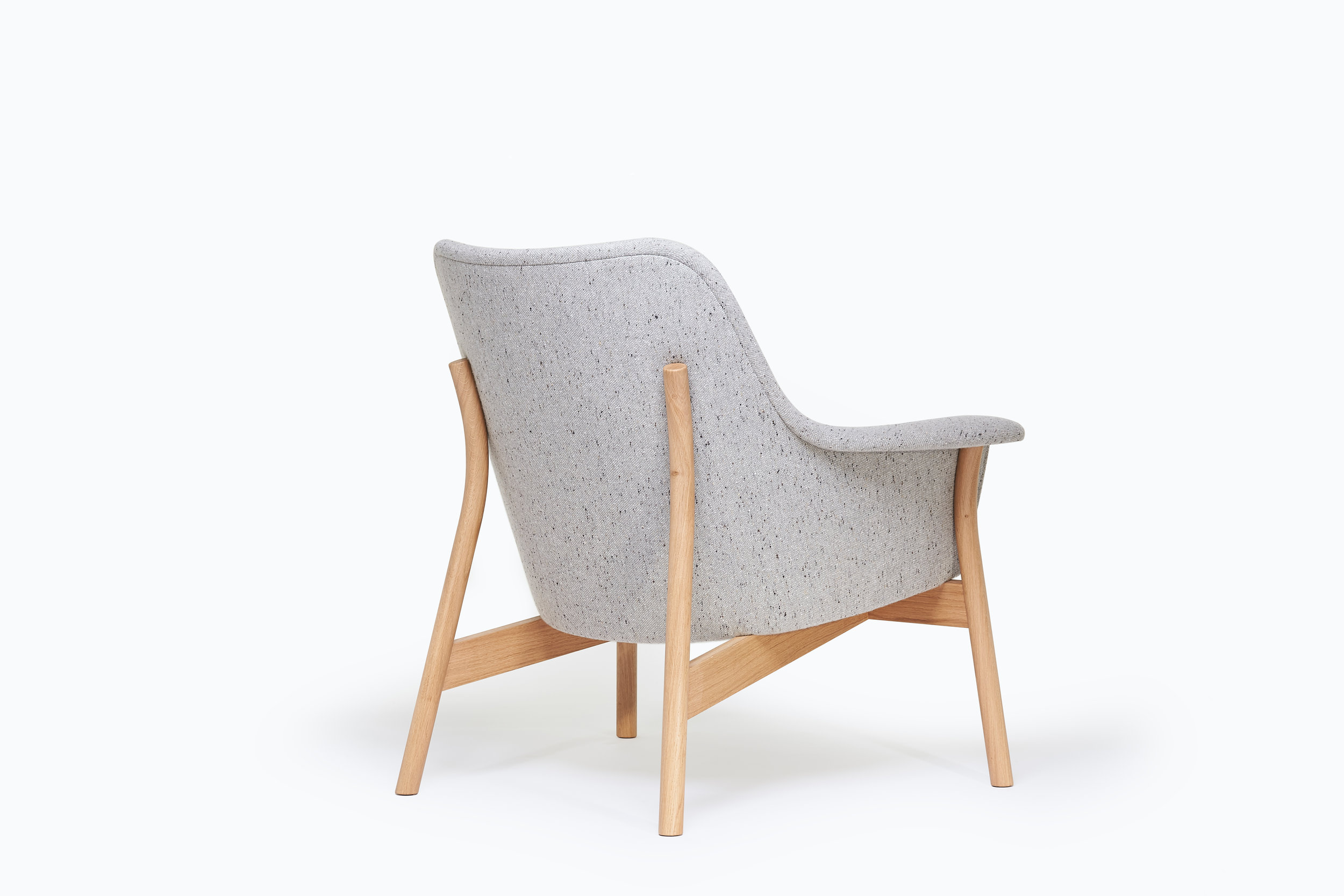 back view of oak and upholstered lounge chair 