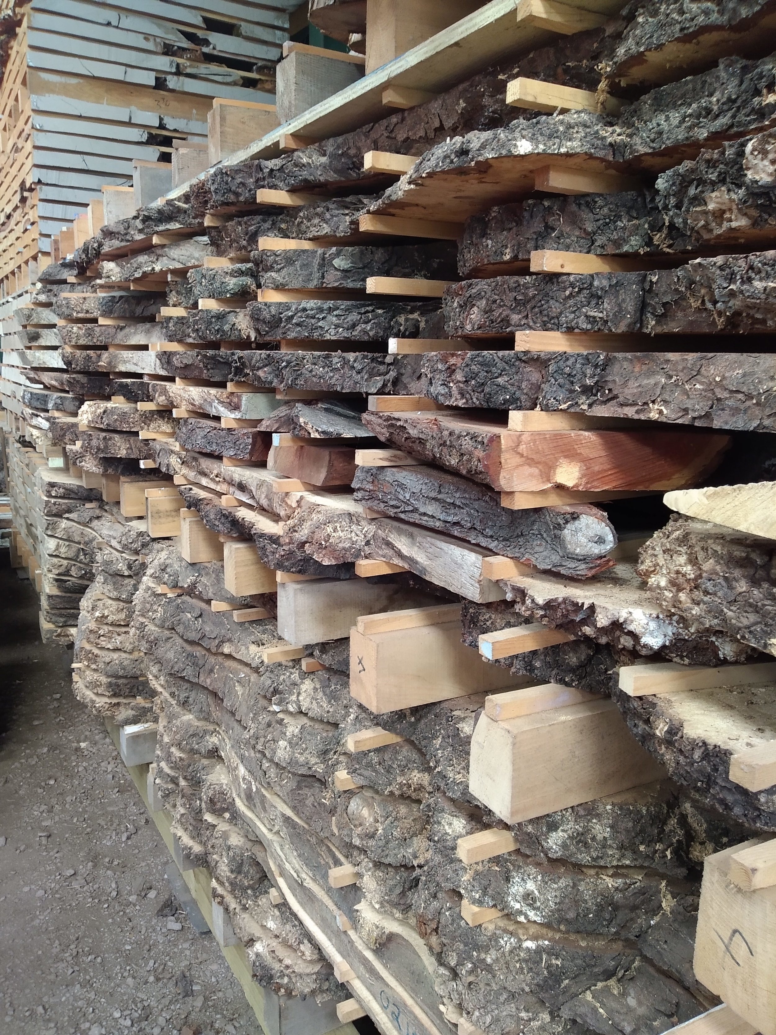 stack of Scottish timber used in bespoke cabinetry designed and hand crafted by Namon Gaston