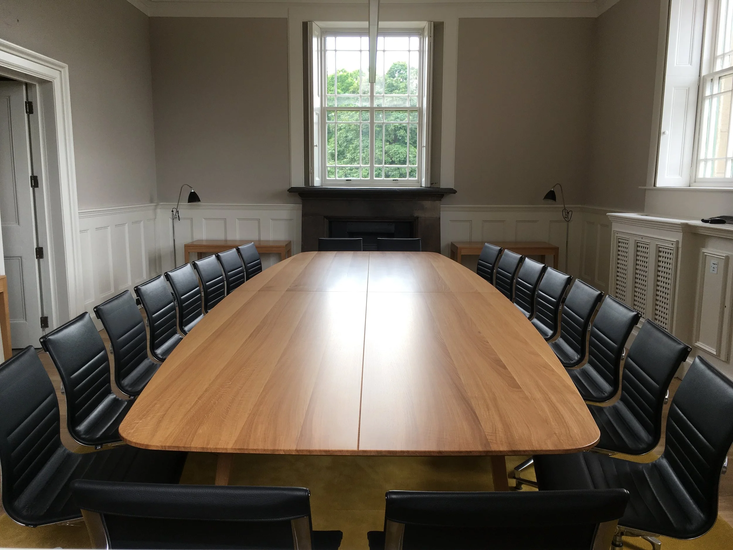 Oak boardroom table and chairs