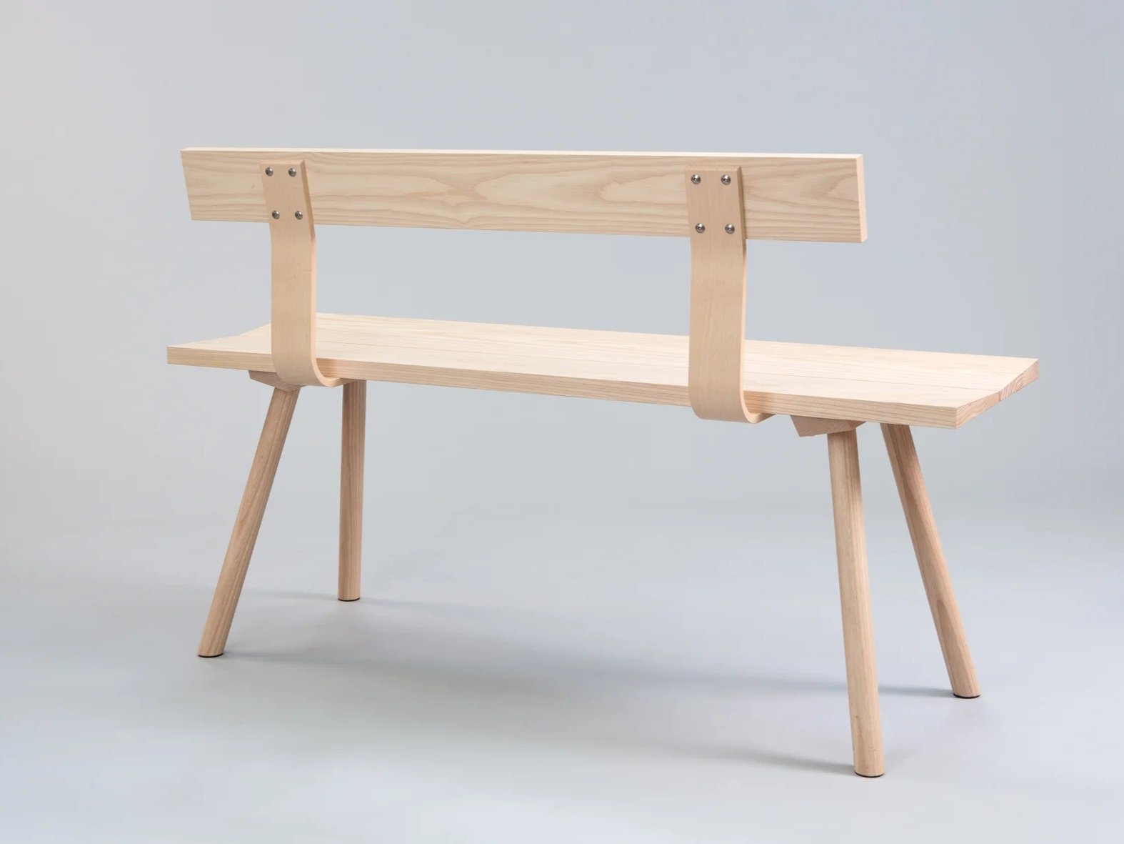 simple wooden contemporary bench, back view, shot in studio