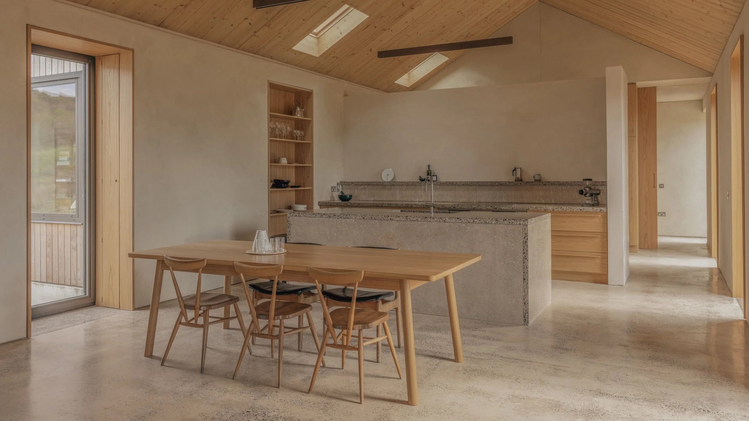 Oak dining table in modern natural home setting