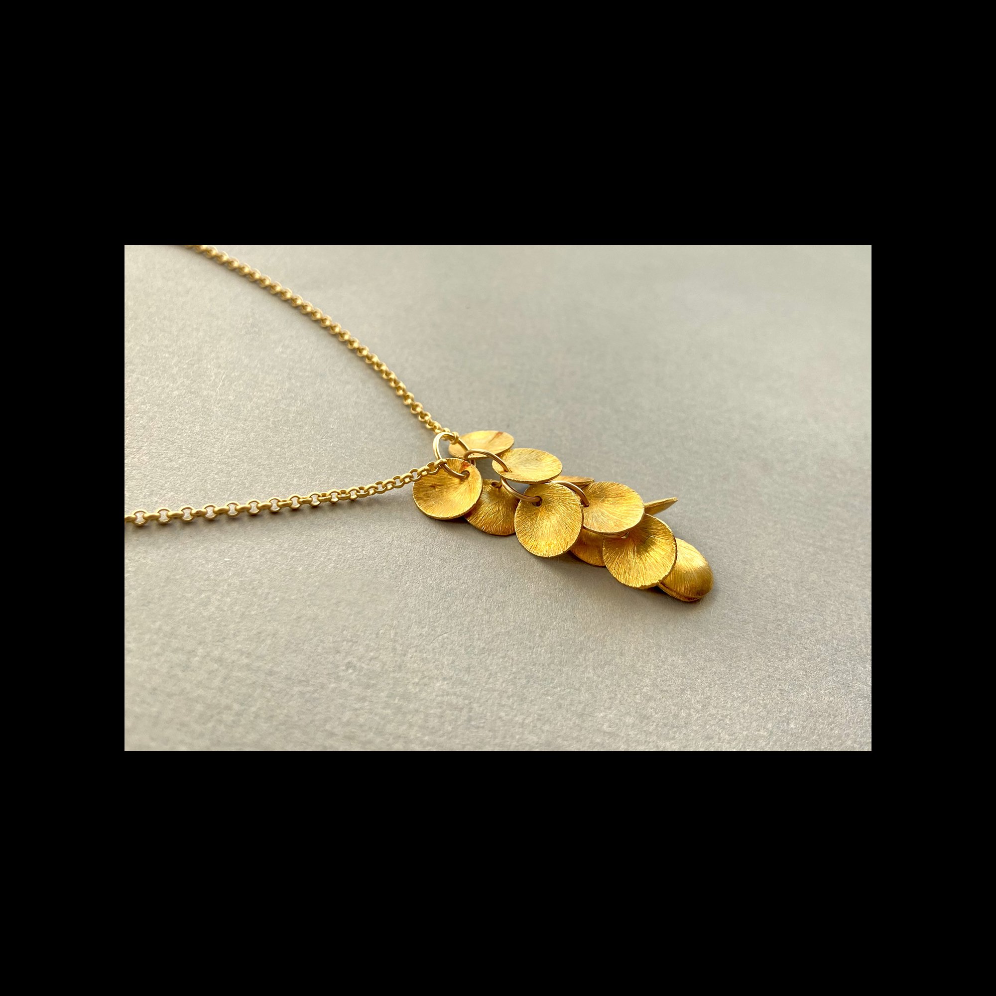 gold disc neck.jpg
