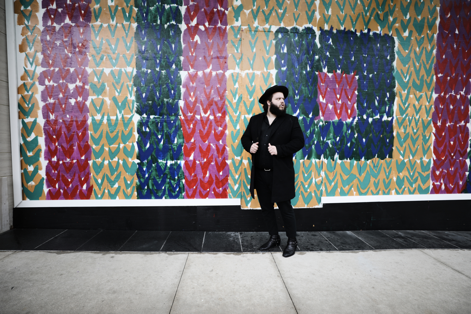 Atlanta based branding and design agency photographs Columbia Records Recording Artist Camino for Riot