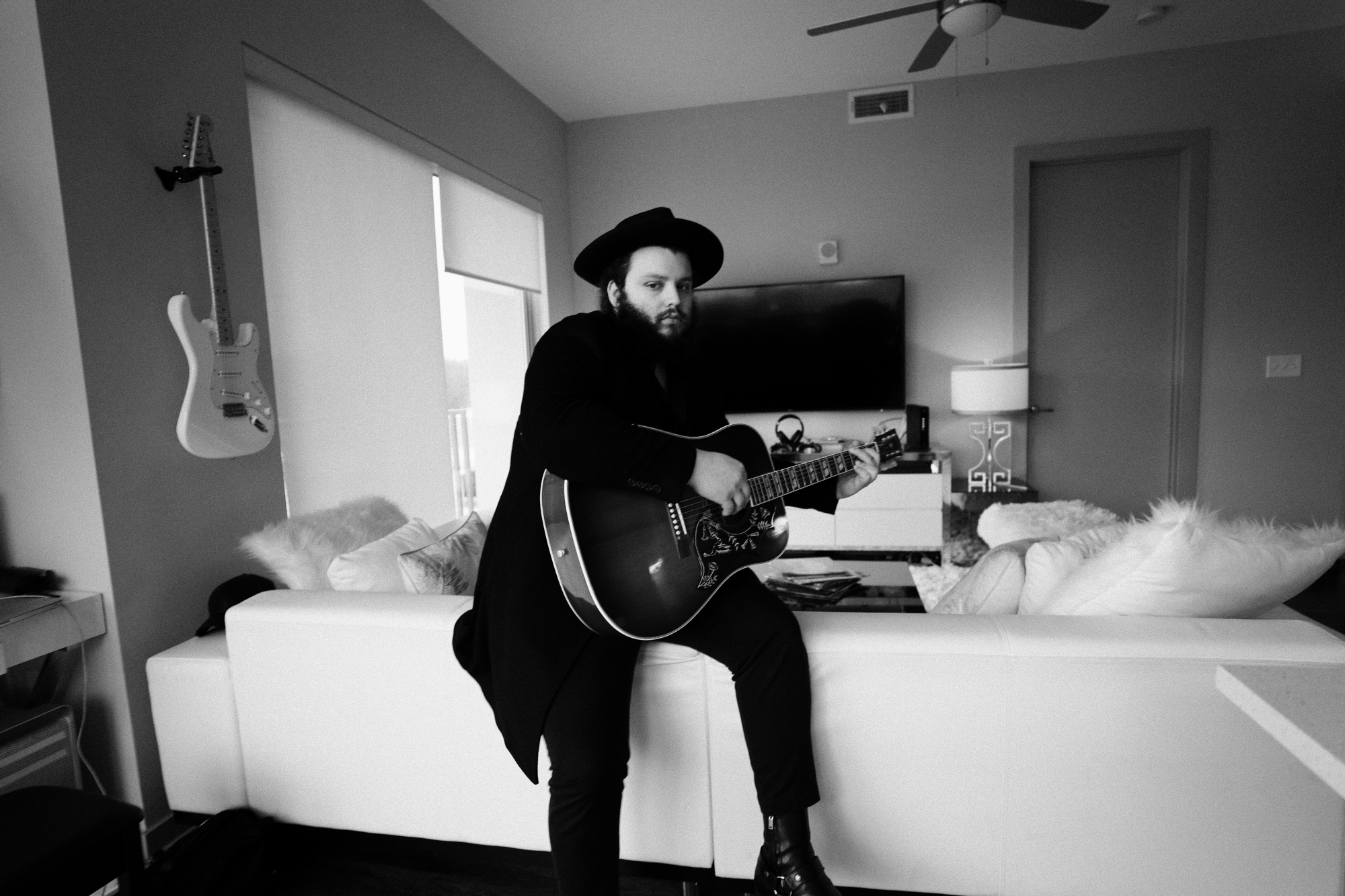 Atlanta based branding and design agency photographs Columbia Records Recording Artist Camino for Riot