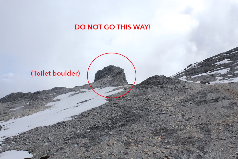 A view towards the toilet boulder. Trend right AWAY from here and do not pass it!