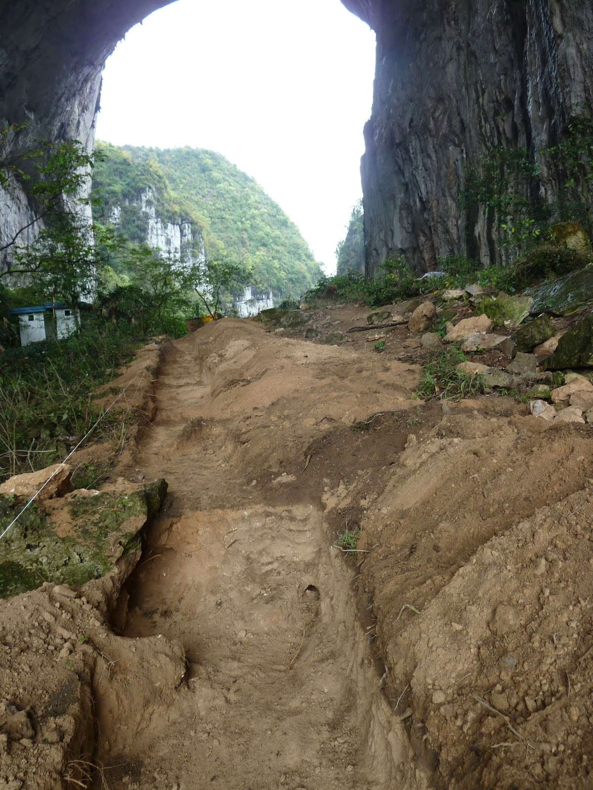 Getu in 2013. Concrete paths and excavation cut through the cave.
