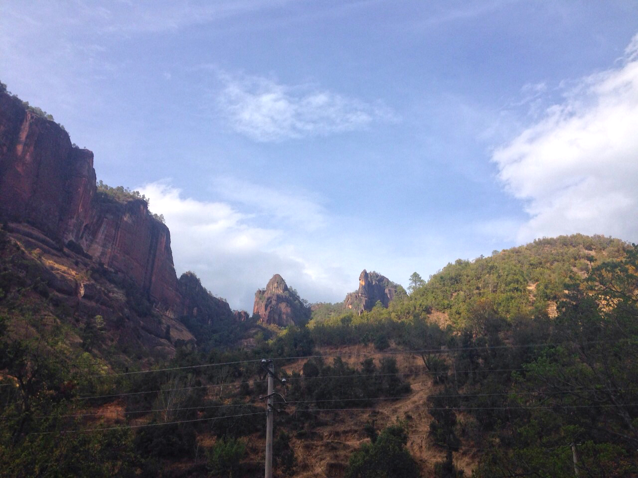 Die Sternwarte (dome-shaped crag on left) and The Guardian on the right as seen from the road in the South Valley.
