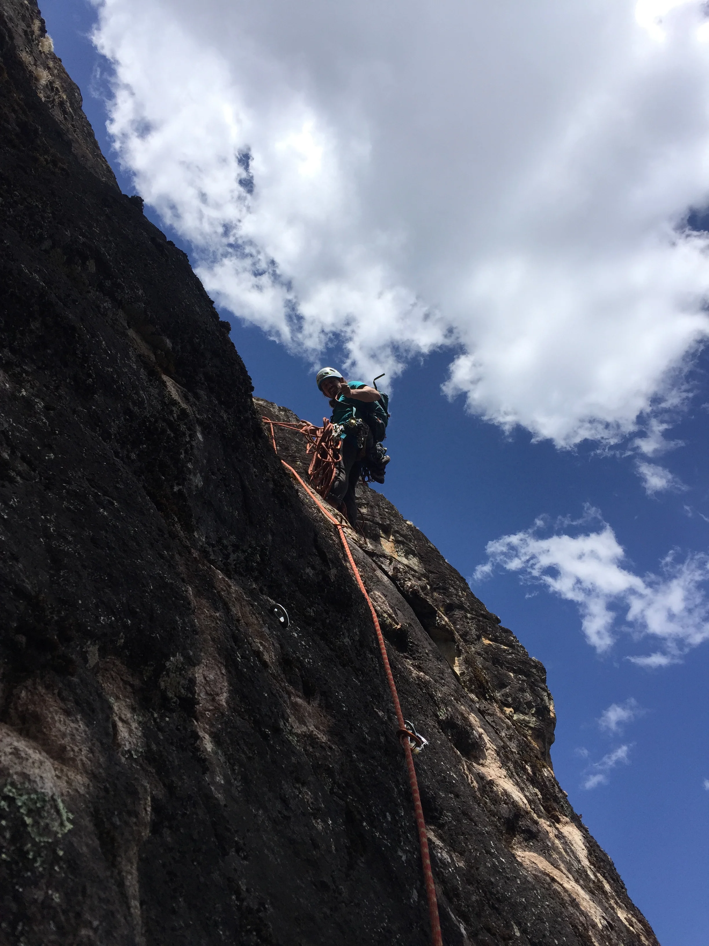 Dane at one of the exposed belay stations mid-way up “It’s Just a Ride.”