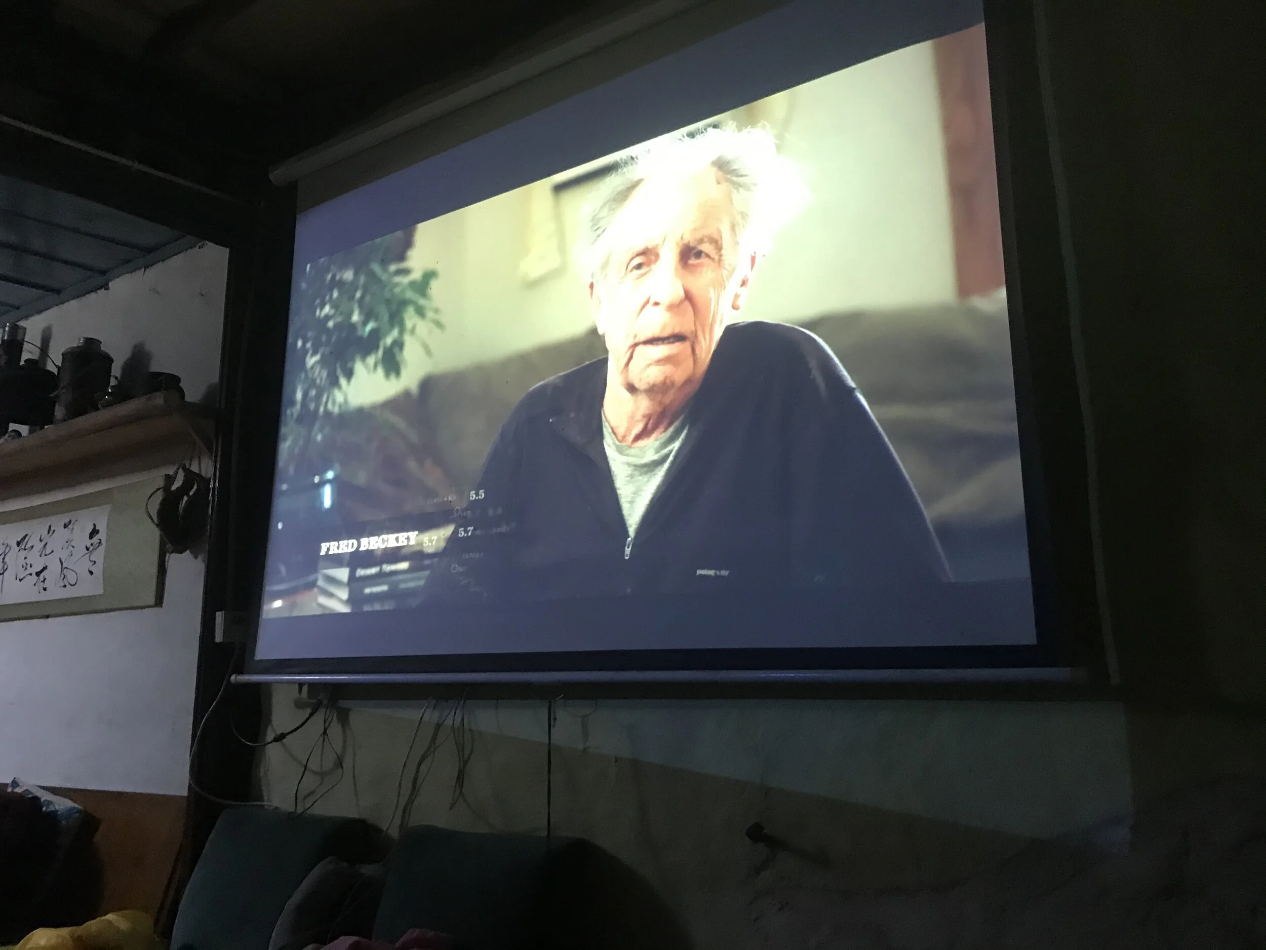 The man who inspired these great adventures: Fred Beckey. Screening the documentary Dirtbag, The Legend of Fred Beckey at the Stone Drum House climbers guesthouse outside of Shigu, Yunnan.