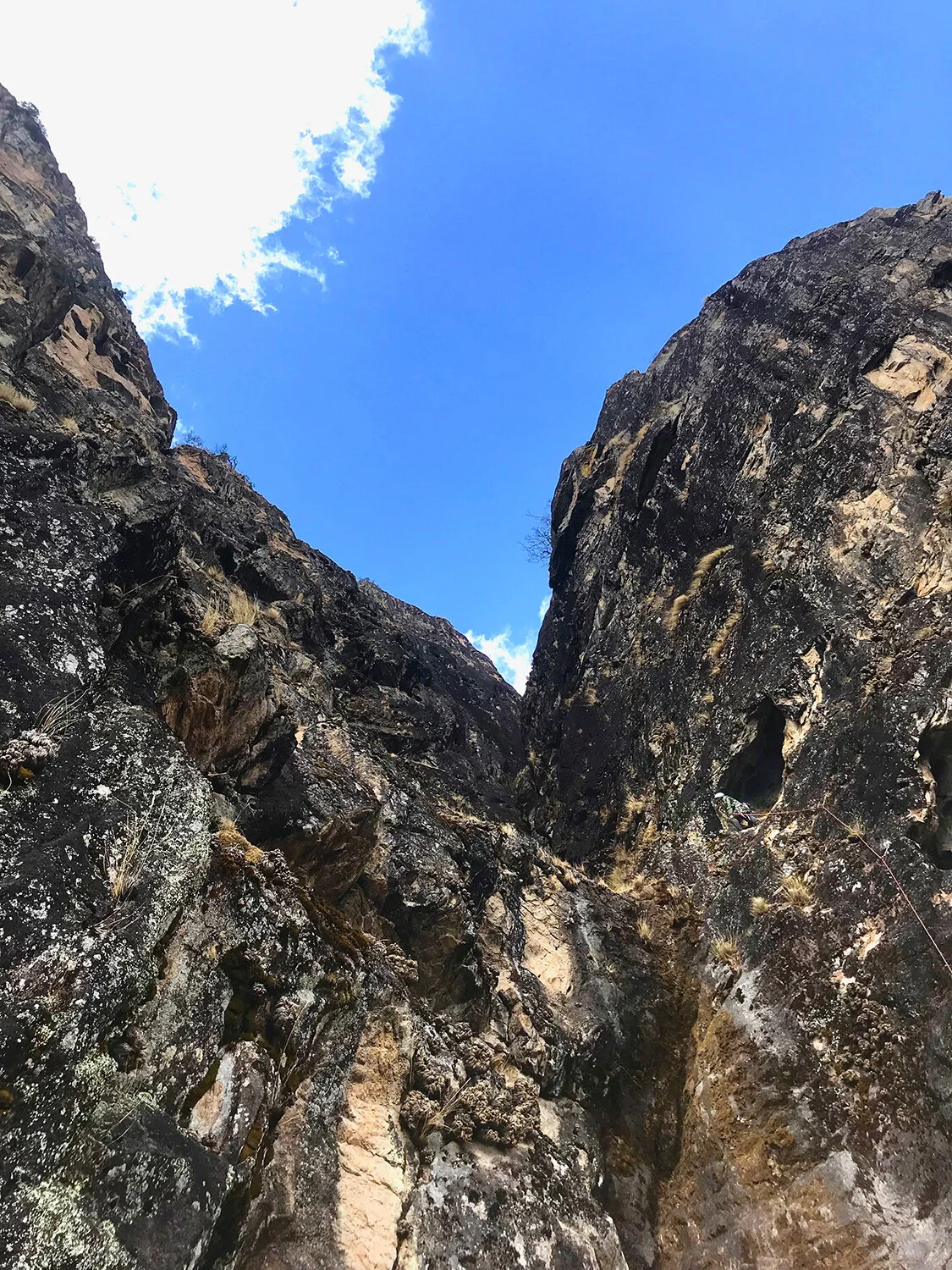 Looking up to Dane on the wall at pitch 6. Though it looks more reachable from below, the face still rose hundreds of meters above us.