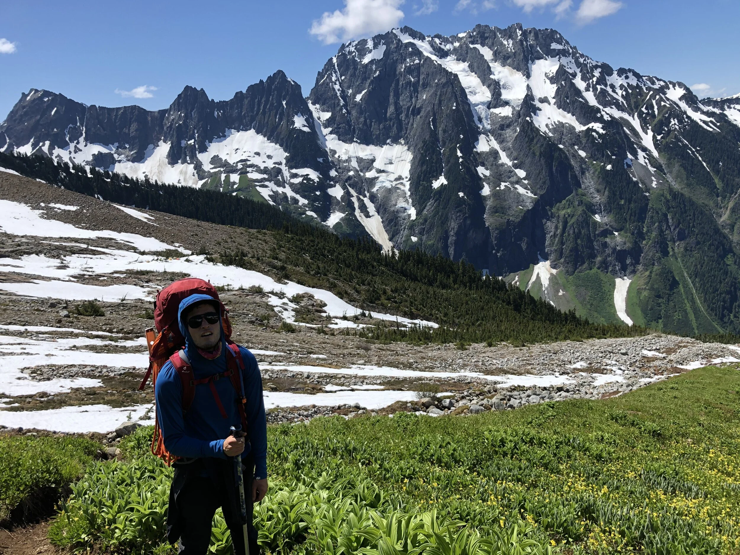 Woody at the top of the section of heather trail before gaining the snowfield and Taboo Glacier