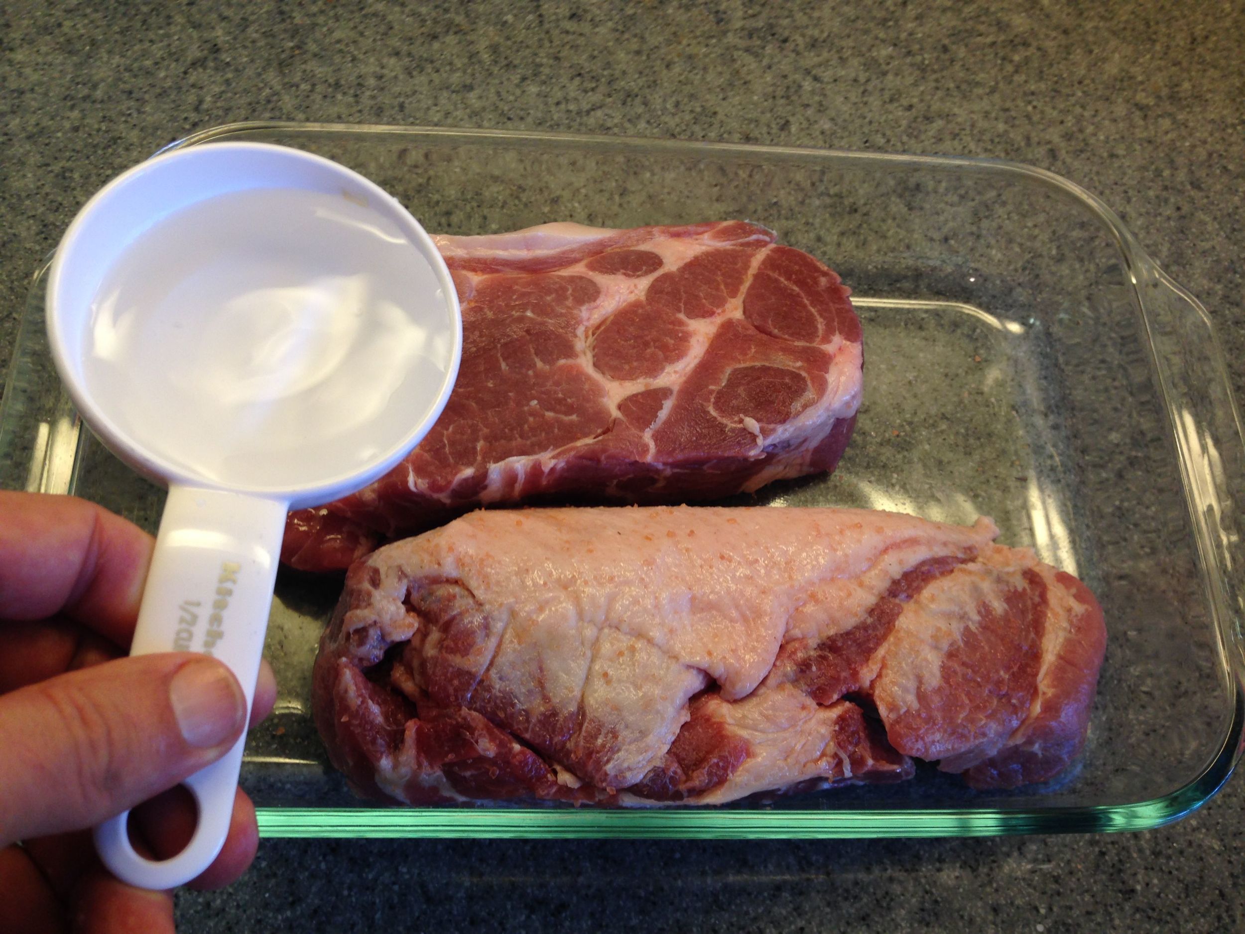 A third of a cup of water. This will steam the meat to tenderness.