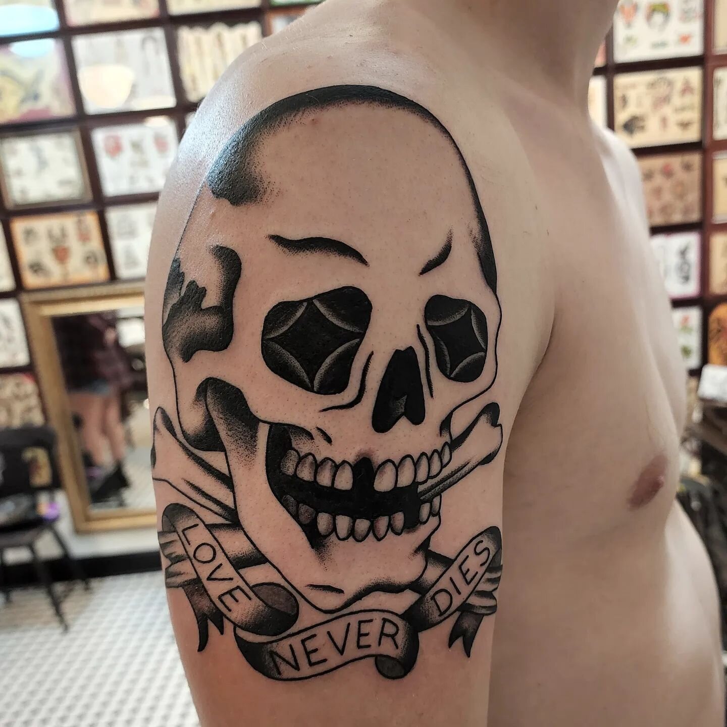 Thanks Chris, what a great start to your sleeve! #loveneverdies #traditionaltattoo #skulltattoo #sleevetattoo #arkansastattooartist #arkansastattoos #nlr #lrafb #thenaturalstate