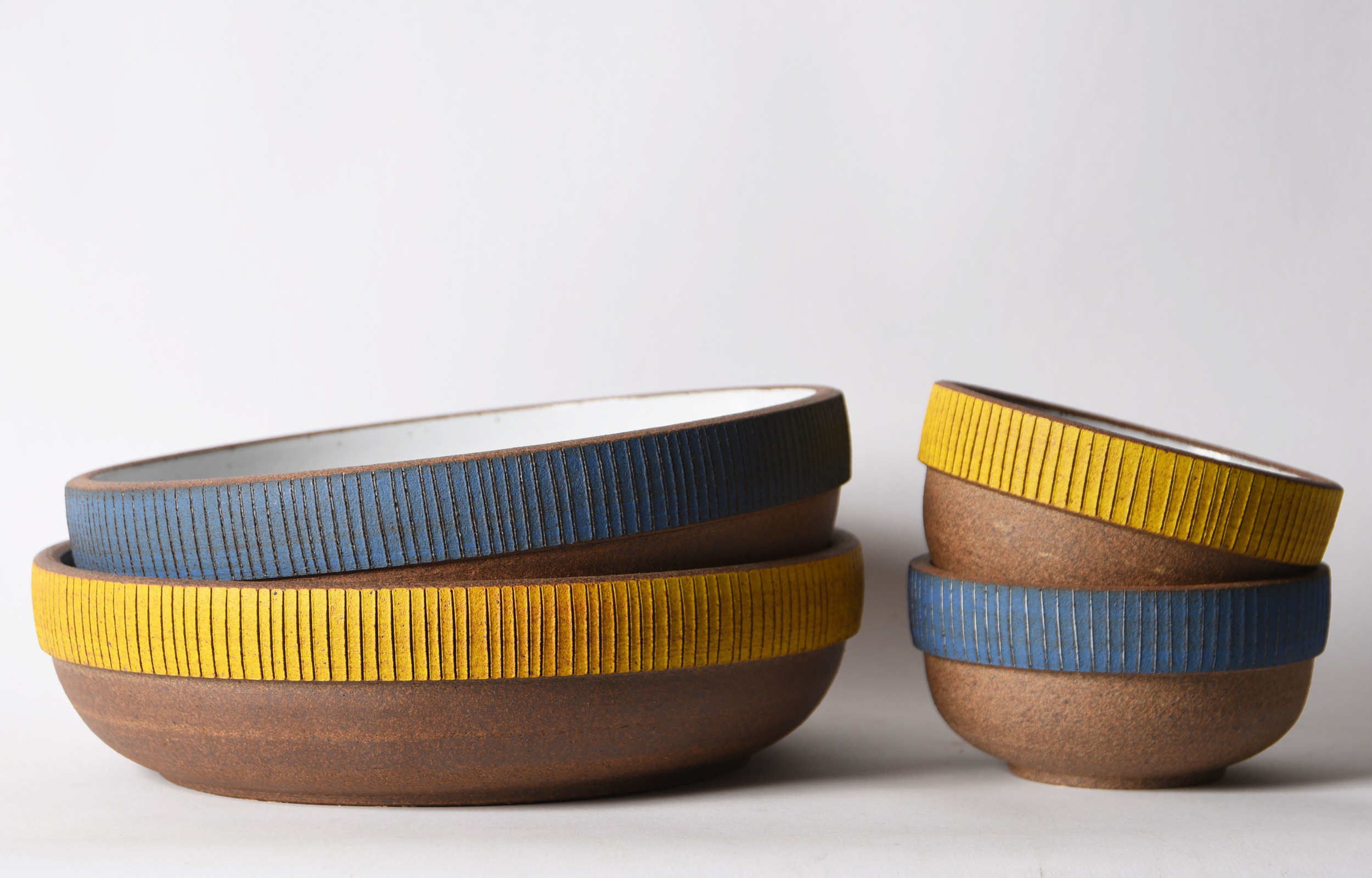 yellow and blue etched blue bowls group.jpg