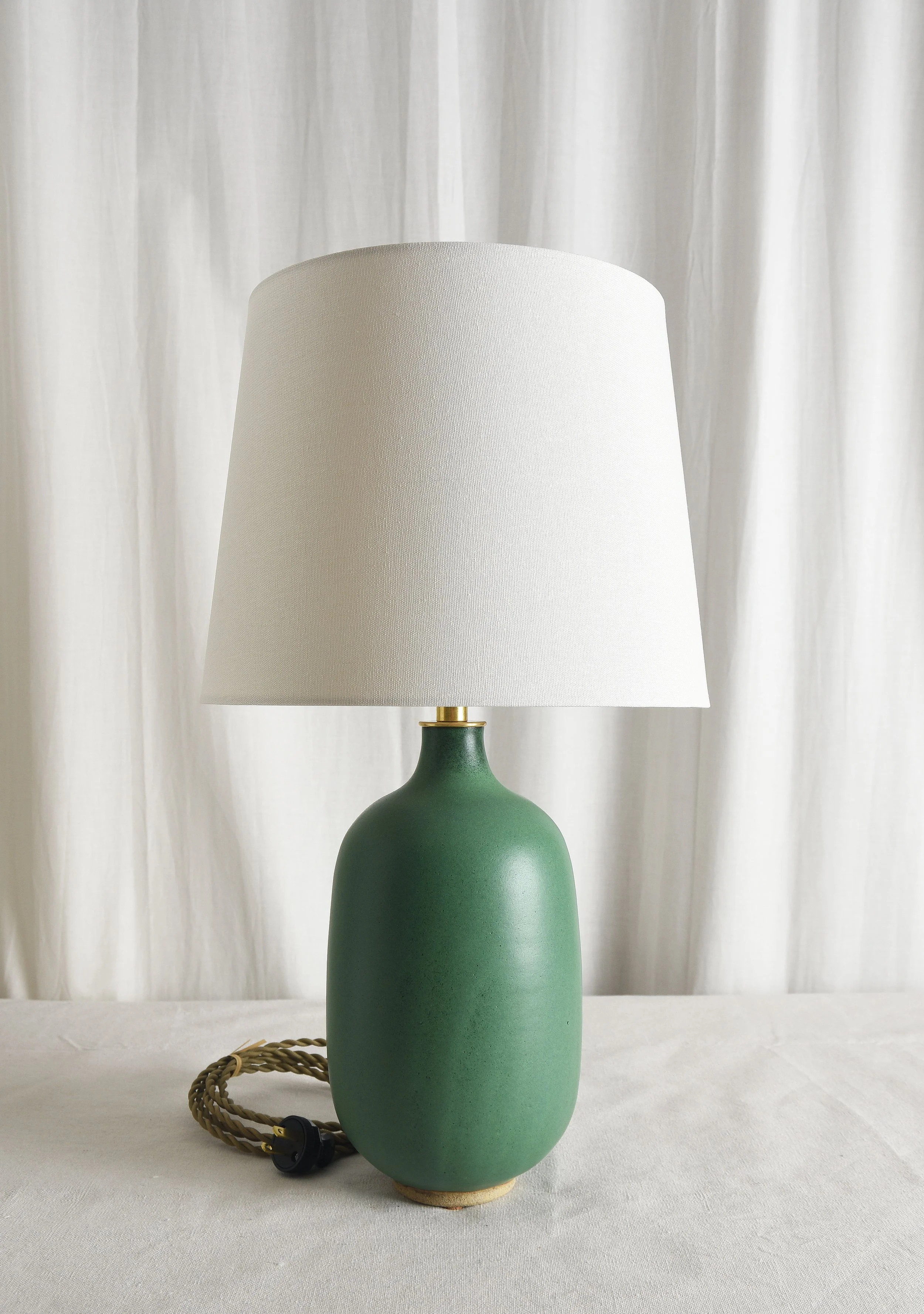 satin green rounded bottle lamp.jpg