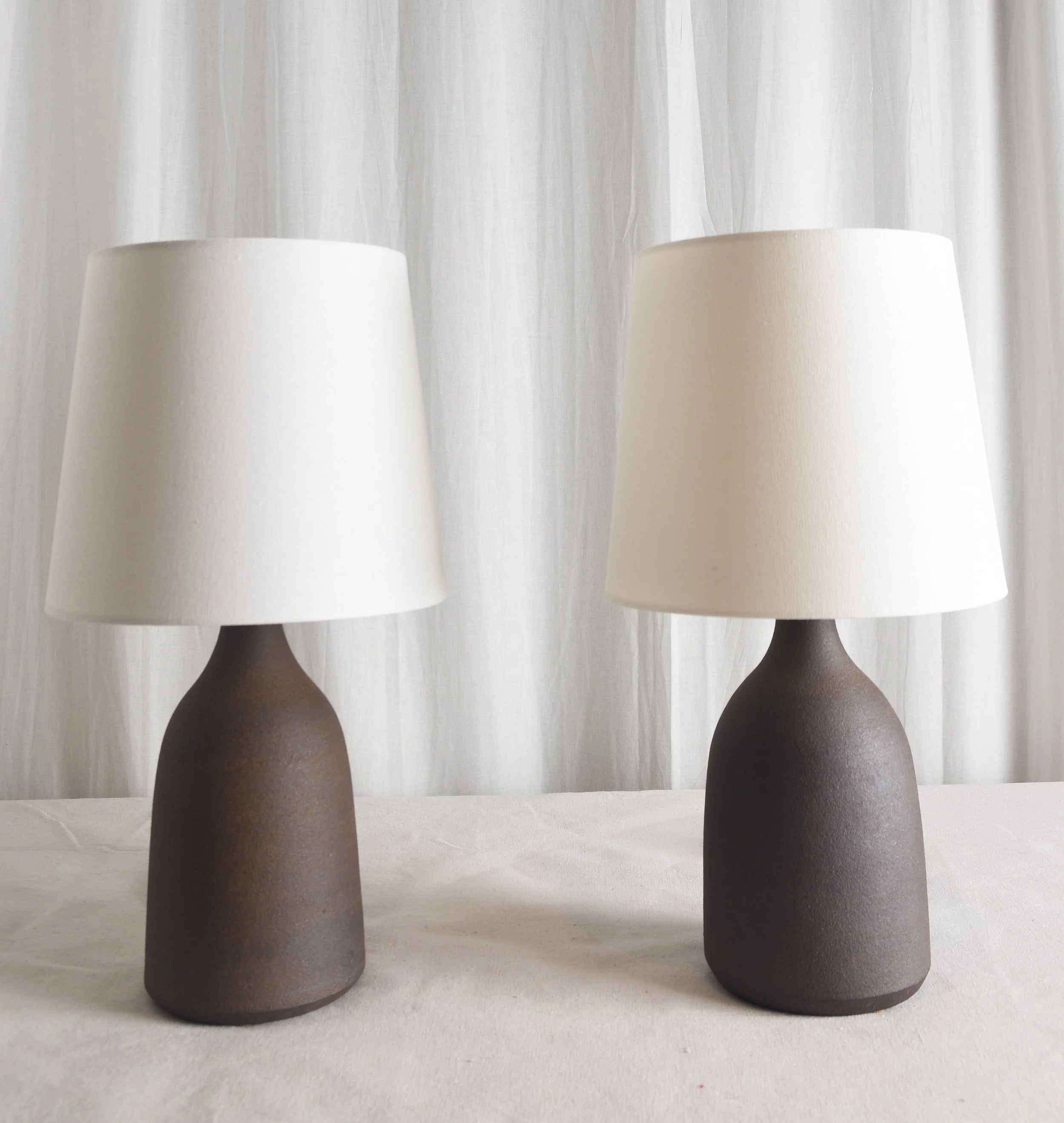 brown raw clay bottle drum.jpg