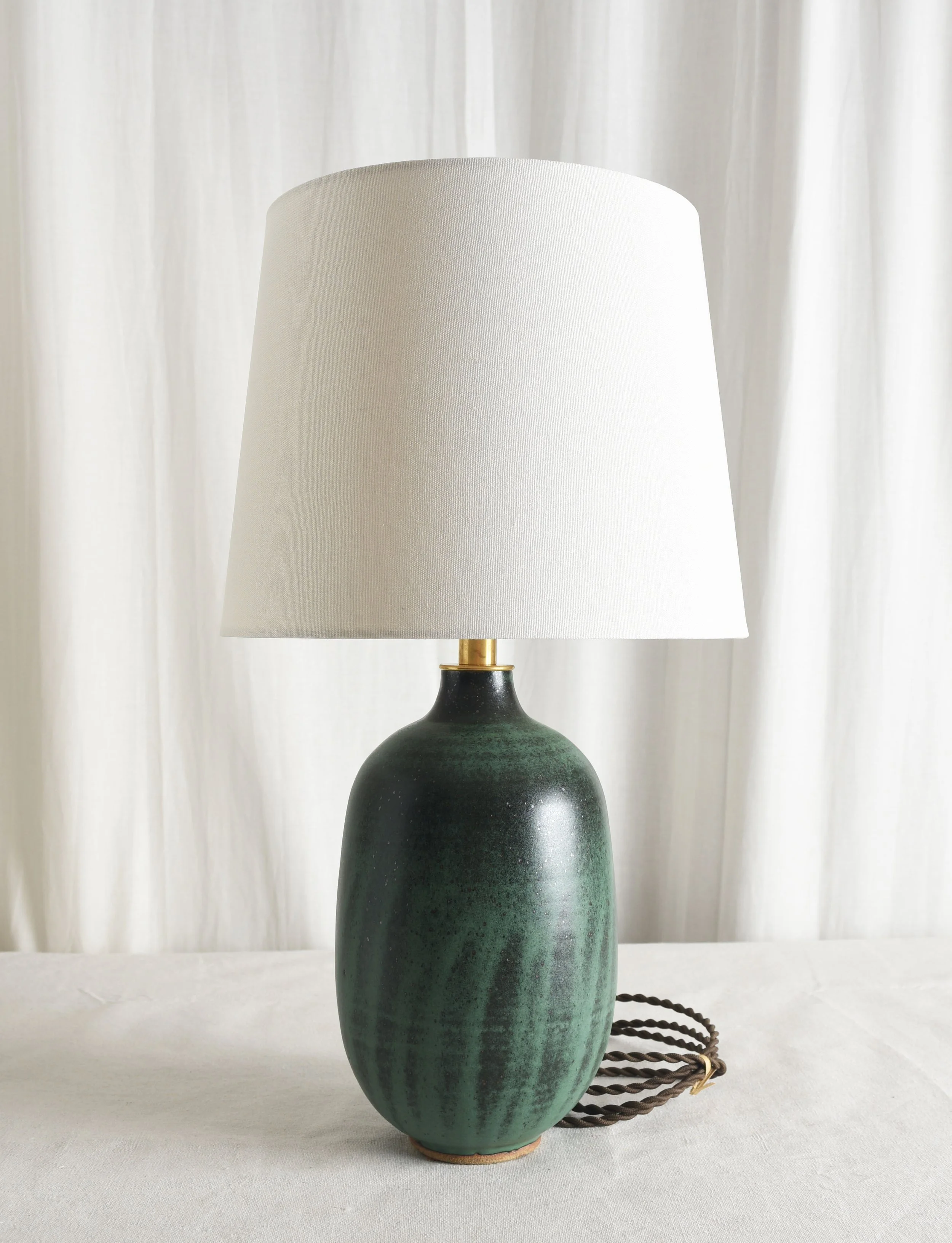 striated satin green black rounded bottle lamp.jpg